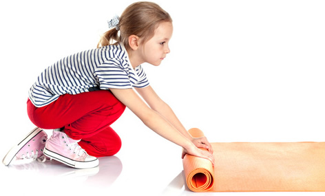 Girl with Yoga Mat-copyright photo_mts/Fotolia.com